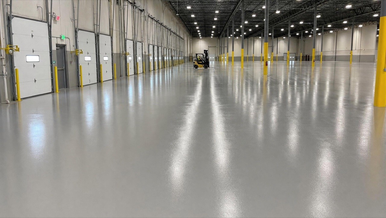 Professional epoxy floor application in a commercial industrial space