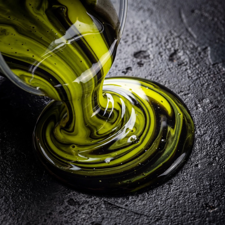 Macro closeup of liquid epoxy resin with acid lime pigment